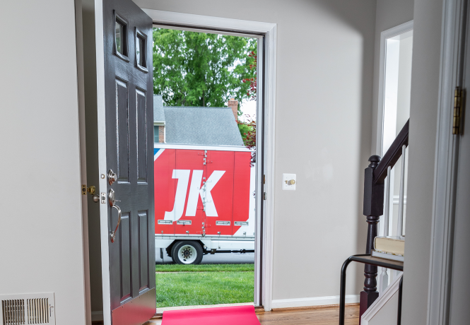 JK Moving truck outside door
