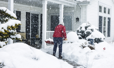 winter moving - shoveling walkway