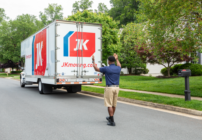 JK Moving truck backing up