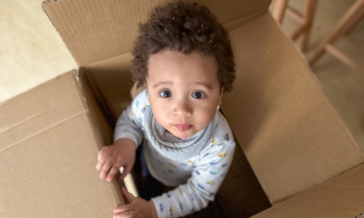 Baby in moving box