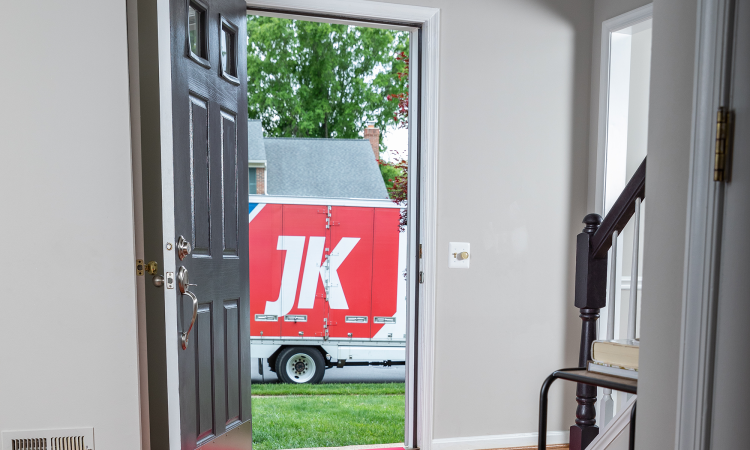 JK Moving truck outside door